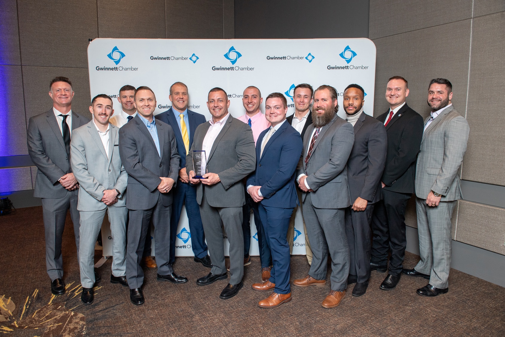 Walton Gas employees presents the Public Safety Unity of the Year honor to the Gwinnett County Police Department Gang Unit at the 2024 Valor Awards